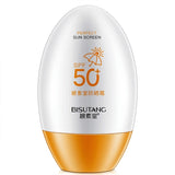 Sunscreen bottle with SPF 50+ on a white background