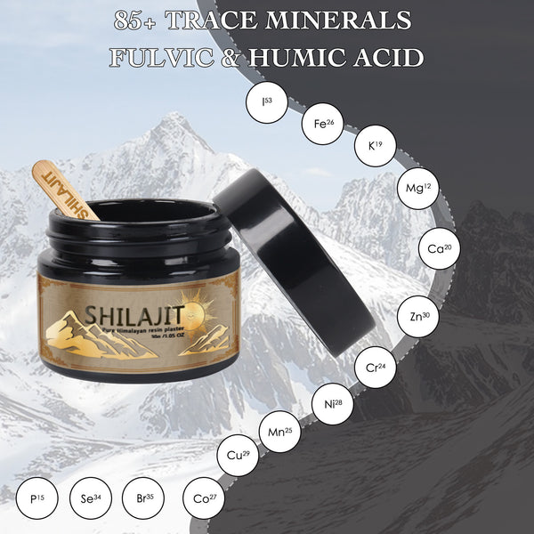 A jar of SHILAJIT resin in front of a mountainous backdrop with a hiker in the distance. The label on the jar indicates the product is a 'Purifying Himalayan resin gift' and provides additional details about the product.