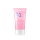 Pink sunscreen tube with SPF 50 on a white background