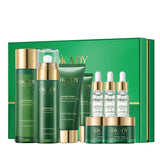 OKADY skincare product set with green and gold packaging on a white background
