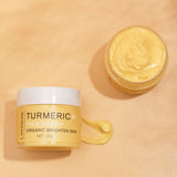 Lanthome Turmeric Face Cream jar with open lid on a beige background