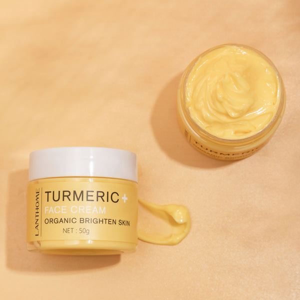 Lanthome Turmeric Face Cream jar with open lid on a beige background
