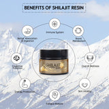 A jar of SHILAJIT resin in front of a mountainous backdrop with a hiker in the distance. The label on the jar indicates the product is a 'Purifying Himalayan resin gift' and provides additional details about the product.