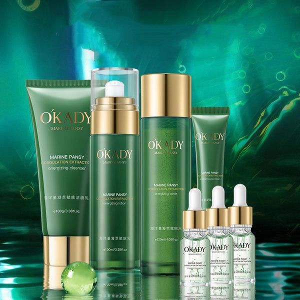 OKADY skincare product set on a green background