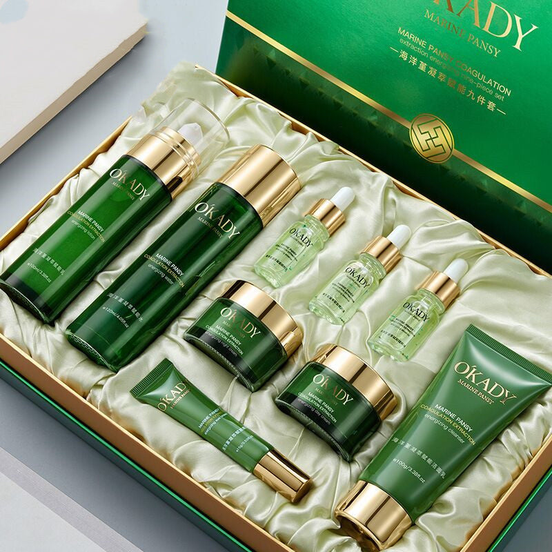 OKADY skincare product set in a decorative box on a light gray background