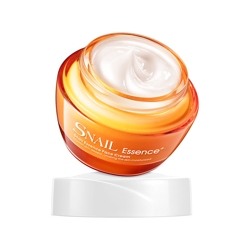 Snail essence face cream jar with visible cream on a white background